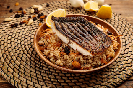 SAYADIYAH or SAYADIEH served in a dish isolated on wooden background side viewの写真素材