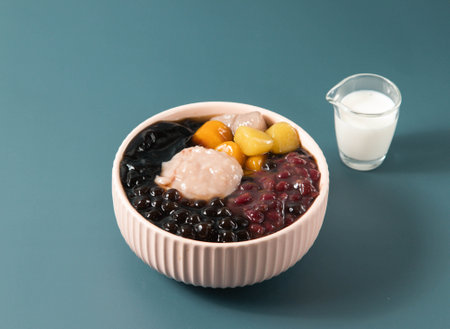 Signature Double Taro Panna Cotta served in bowl isolated on background top view of taiwan foodの写真素材