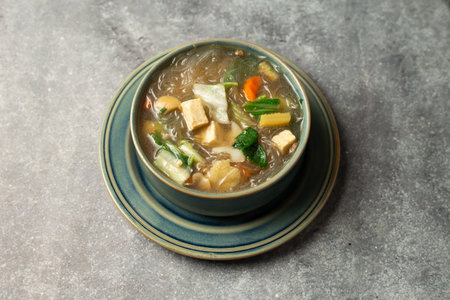 Tofu Veg Soup served in dish isolated on background top view of bangladesh foodの写真素材