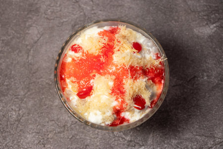 Faluda or falooda with khoya, sharbat, noodles, kulfi, mitha, rabri served in dish isolated on background top view of bangladesh foodの写真素材