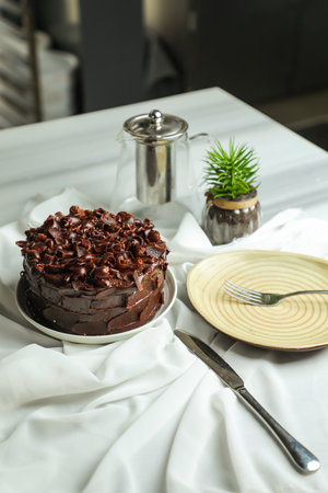 Chocolate Fudge Cake served on food table top view cafe bake dessert