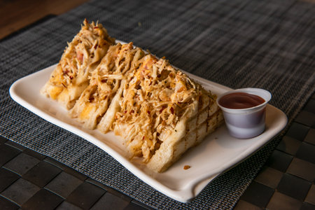 Club Sandwich with dip sauce served in dish top view of fastfoodの写真素材