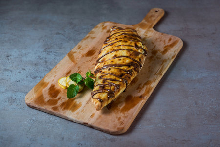 Nutella Chocolate Pizza with black pepper serving on wooden cutting board isolated on grey background top view of fastfoodの写真素材