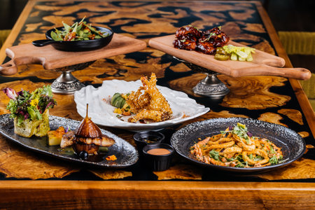 Seared Duck Liver, Pate de Foie Gras, Calamari Fritti squid rings, Fried Chicken Wings, Prawn and...