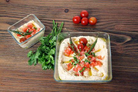 Old Cheese with Tomato and Coriander served in dish isolated on wooden table top view of arabic food