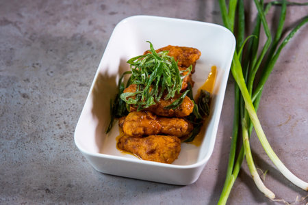 Buffalo Wings served in dish isolated on grey background top view of bahrain food