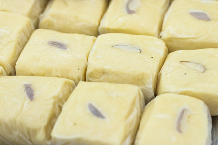 Mango Sandesh Manda or Monda texture closeup side view of Indian, pakistani and bangladeshi sweet dessert foodの写真素材