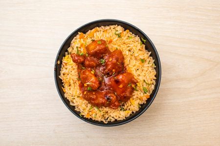 Spicy Thai chicken Rice Bowl served in bowl isolated on table side view of foodの写真素材