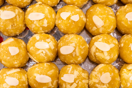 Mawa Laddu topping with nuts texture closeup top view of indian, pakistani and bangladeshi sweets dessertの写真素材