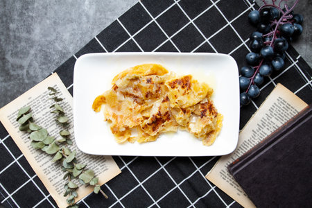 Crispy Roti, paratha bites or choori served in tray dish isolated on napkin top view of indian, pakistani and bangladeshi foodの写真素材
