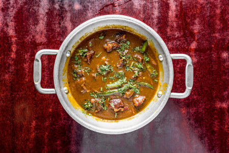 Mutton Nawabi Karahi korma curry served in bowl isolated on table background top view of bangladeshi, indian and pakistani foodの写真素材