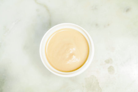 Almond milk Tea served in cup isolated on grey background top view of asian drinkの写真素材