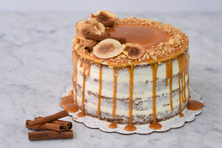 Caramel Fig Drip Cake featuring layers of moist cake drizzled with rich caramel, topped with dried...