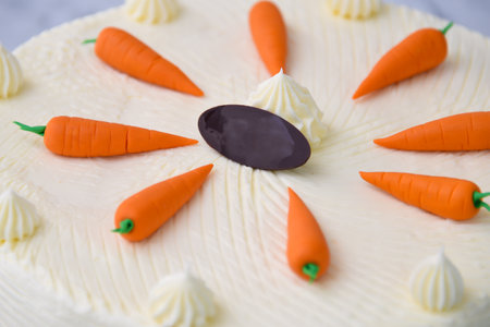 Decorated Carrot Cake, featuring moist and spiced cake layers covered in smooth cream cheese frosting closeup view of delicious cakeの写真素材