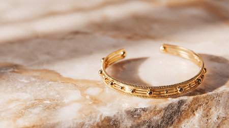 Beautiful golden braceletle background. Luxury jewelry and accessories.の素材