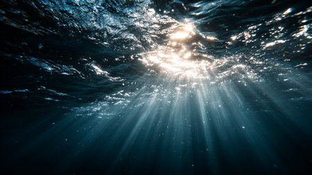 Tranquil underwater scene with sunbeams and rays of lightの素材