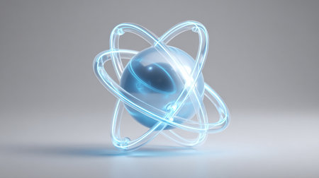 3d render of atom with blue neon light on gray background.の素材