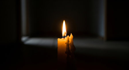Candle light in dark room with copy space for add text.の素材