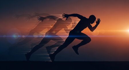 Silhouette of a man running in front of a sunset backgroundの素材