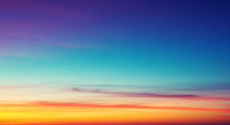 Beautiful sunset sky with clouds. Colorful twilight sky background.の素材