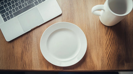 laptop and coffee cup on the wooden table, vintage color toneの素材