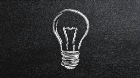 Light bulb drawn on chalkboard, concept of idea and innovation.の素材
