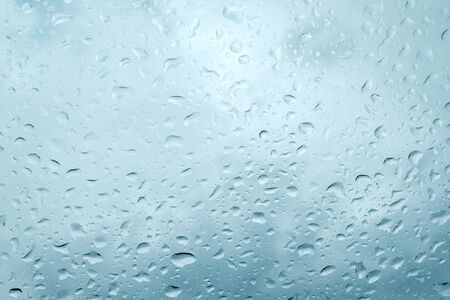 Rain drops on car window, Textures of water droplets of rain flow