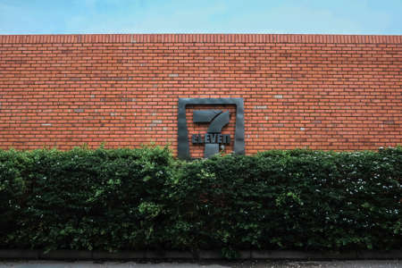 AYUTTHAYA, THAILAND - April 14, 2021: 7 eleven logo on a facade. 7-Eleven is an international chain of convenience stores that operates primarily as a franchiseのeditorial素材