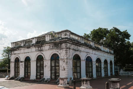 Samut Prakan, Thailand - june 19, 2021: The buildings of the abandoned mine ,Photo of old building in town against skyのeditorial素材