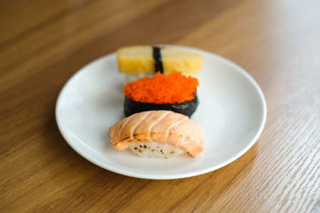 Crab stick sushi or Japanese kani sushi set on white plate, Japanese food styleの写真素材