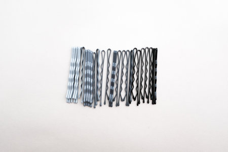 Hairpins on white background.の写真素材