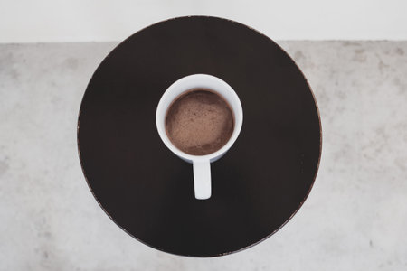 Hot chocolate drink in a white ceramic cup.
