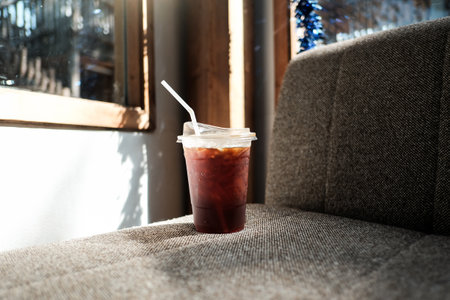 iced black coffee in take away plastic glass.の写真素材