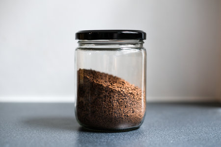 Instant coffee in jar with black lid.の写真素材
