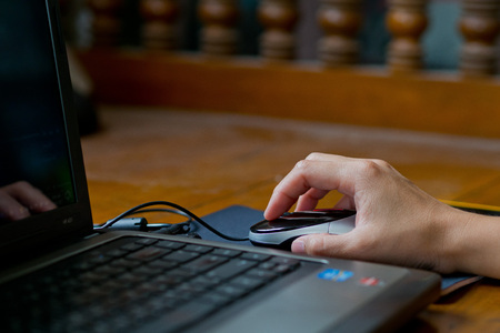 hand typing keyboard labtop