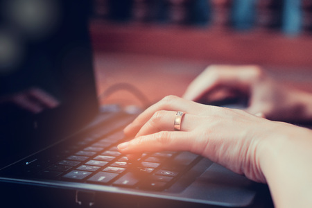 hand typing keyboard labtop