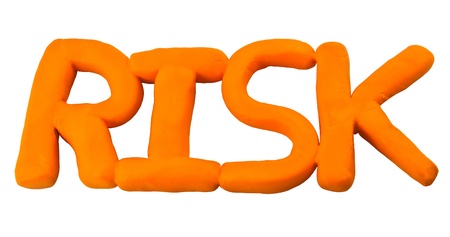 Orange risk wording made from clay