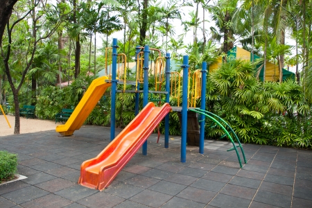 orange and yellow slider in play ground in park