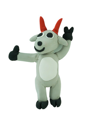 Standing goat thumbs up on white nackgroundの写真素材