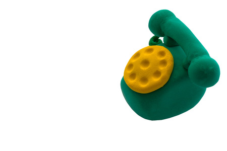 Green rotary telephone made from plasticineの写真素材