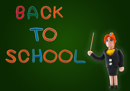 colorful wood pencil color frame border background with back to school on chalk boardの写真素材