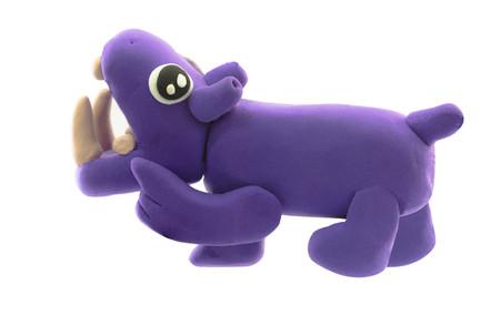 Purple Plasticine Hippo in point on teeth action on white