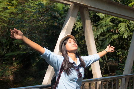 asian Woman with backpack in nature concept relax or happyの写真素材