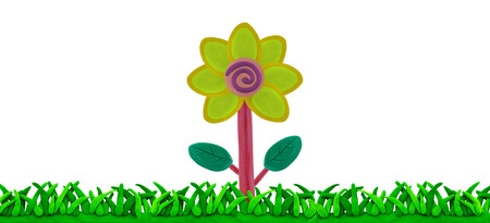 flower on grass field made from plasticineの写真素材