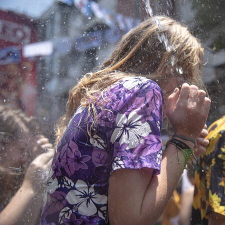 Bangkok, Thailand - April 13, 2018 : Tourists enjoy with splashing water on the second day of water festival in Khao San Road, Let's play with soaked together on Songkran's day in Bangkokのeditorial素材