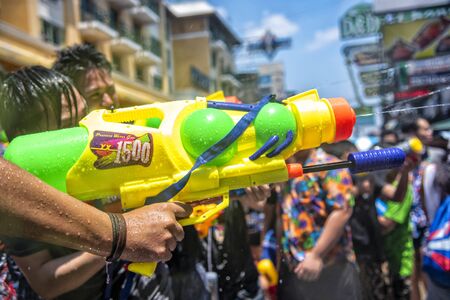 Bangkok, Thailand - April 13, 2018 : Water gun in water festival in Khao San Road, Let's play with soaked together on Songkran's day in Bangkokのeditorial素材