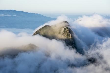 Mountains of Doi Sam Phi Nong above the clouds with sea of the mist at Doi Luang Chiang Dao in Chiang Mai, Thailandの写真素材