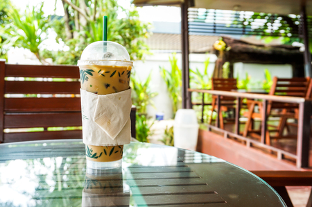 Ice coffee  on the wooden tableの写真素材