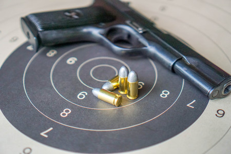 Shooting and shelling, the concept of using her gun.の写真素材