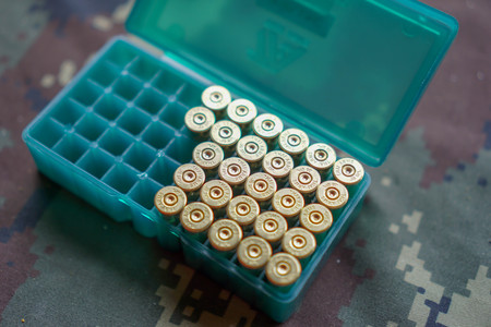 Shooting and shelling, the concept of using her gun.の写真素材